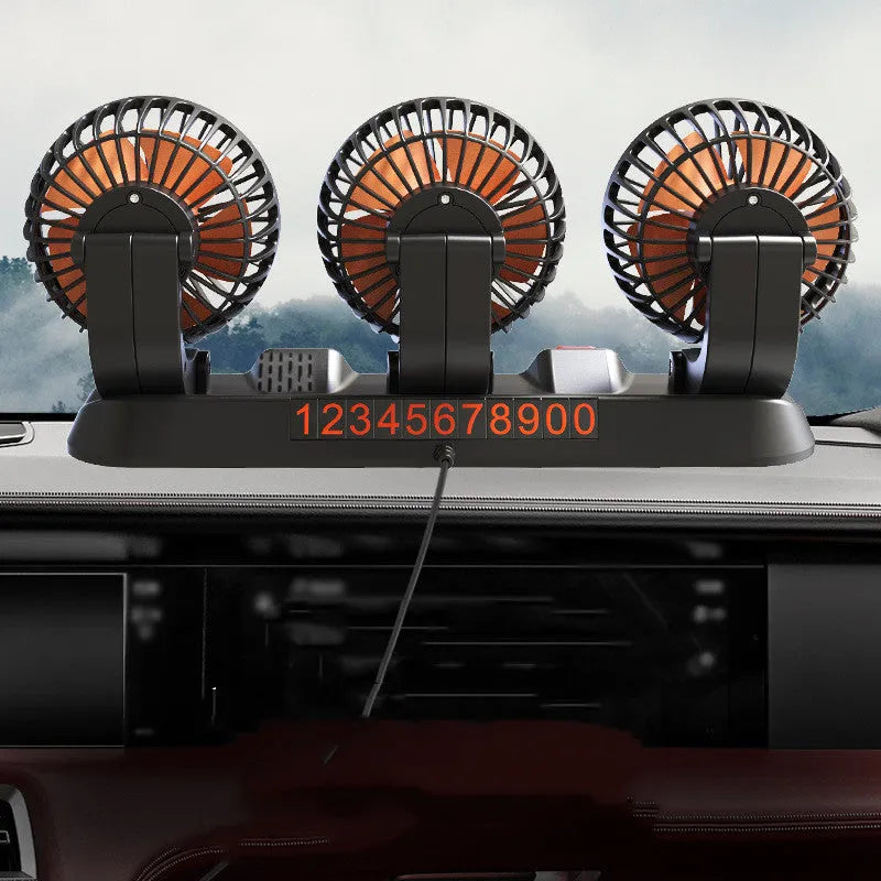 Three-head adjustable automotive electric cooling fan with a long power cable.