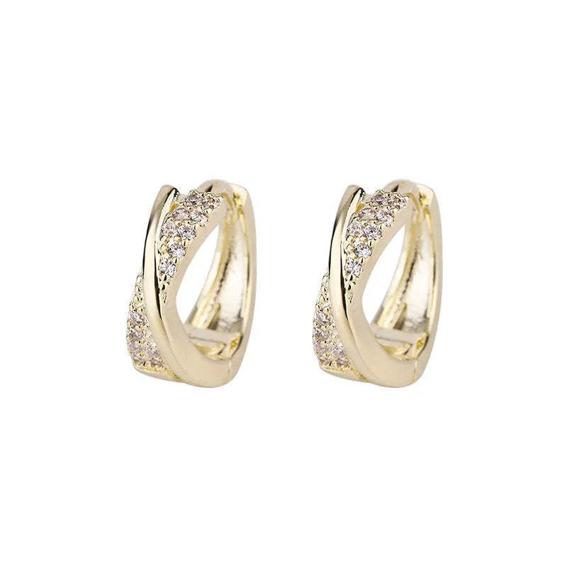 Geometric wild earrings in copper with zircon details and 14K yellow finish
