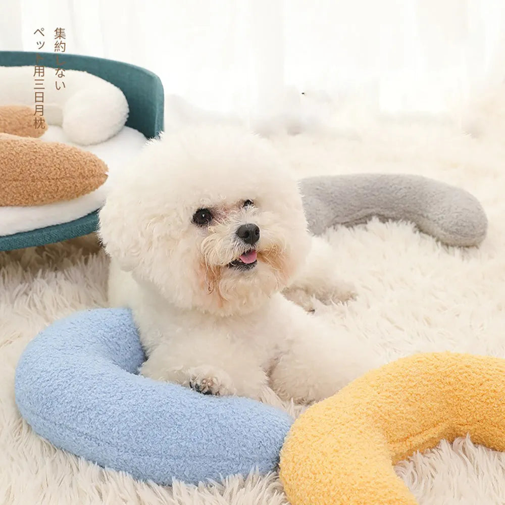 Blue U-shaped cat pillow with adjustable neck collar for sleeping support