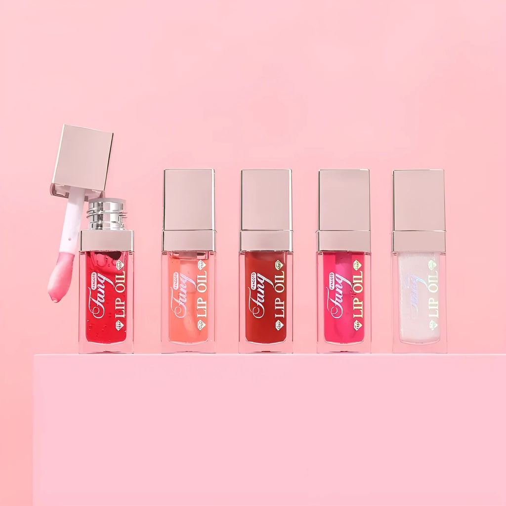 Five colour shades of moisturising lip gloss mint lipstick with lip essence oil.