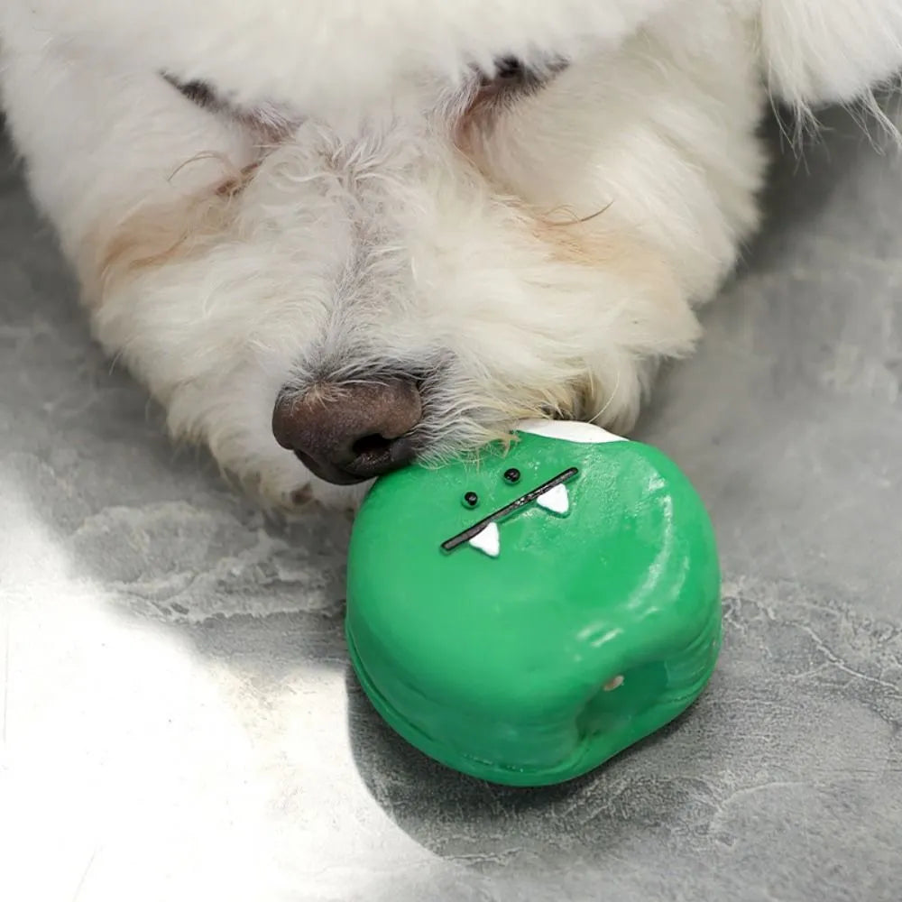 Yellow and green cartoon egg bread shaped latex squeaky toy for dogs on a white background.