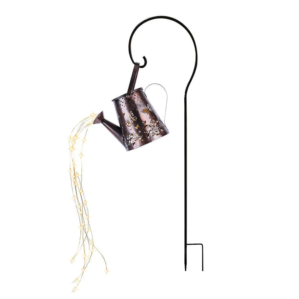 Solar-powered tapered butterfly pattern iron garden lamp emitting warm white light.