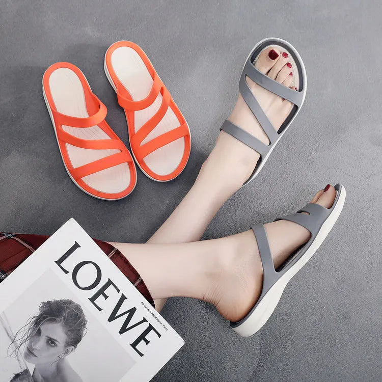 Women's solid colour casual sandals with a breathable PP upper in red, shown from the side.