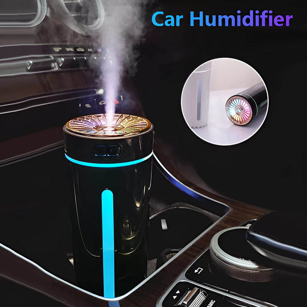 Black wireless USB humidifier with colourful lights on a car dashboard cup holder