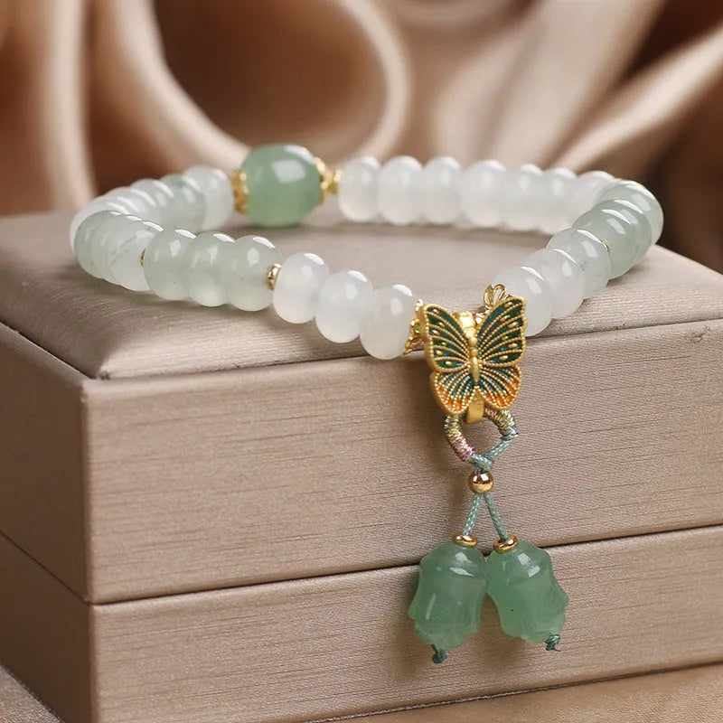 Green Tian Shan Cui abacus bead bracelet with retro butterfly tassel and pearl decoration