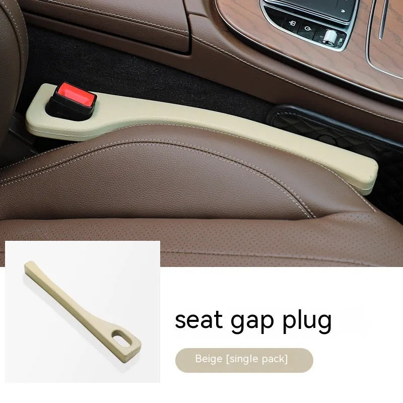 Polyurethane car seat gap filler strip in beige colour against a car interior