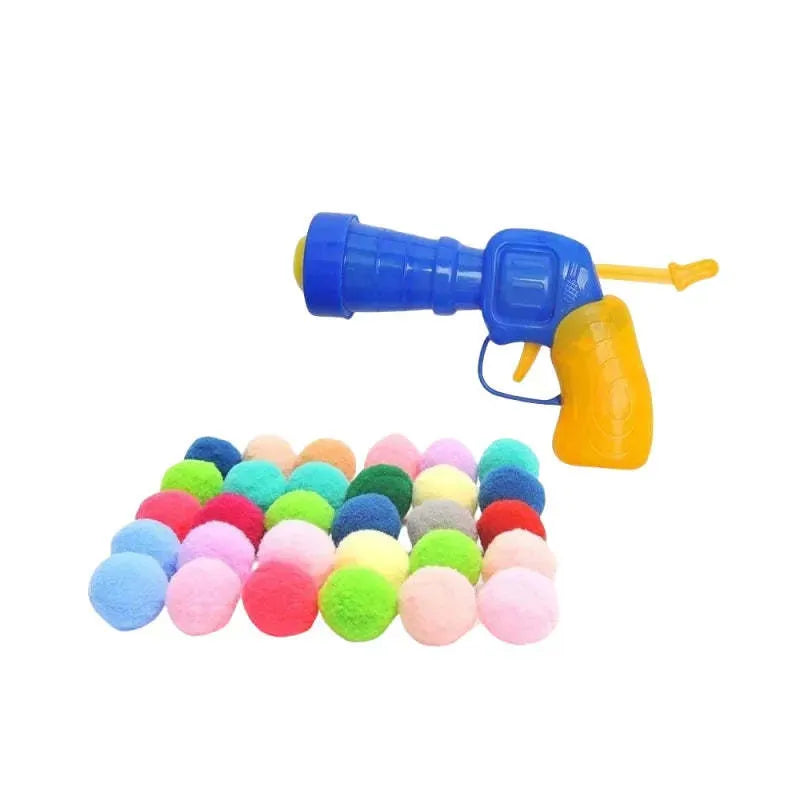 Interactive pet toy gun with multiple plush balls for dog and cat play sessions