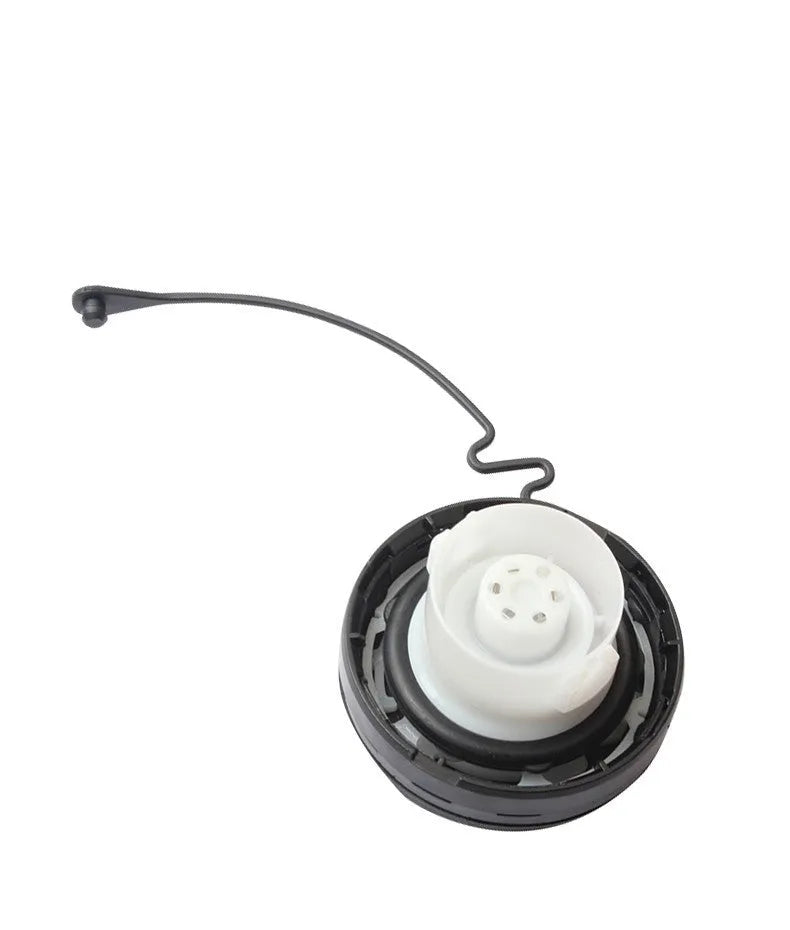 Black plastic Toyota snap-type fuel tank cap replacement part