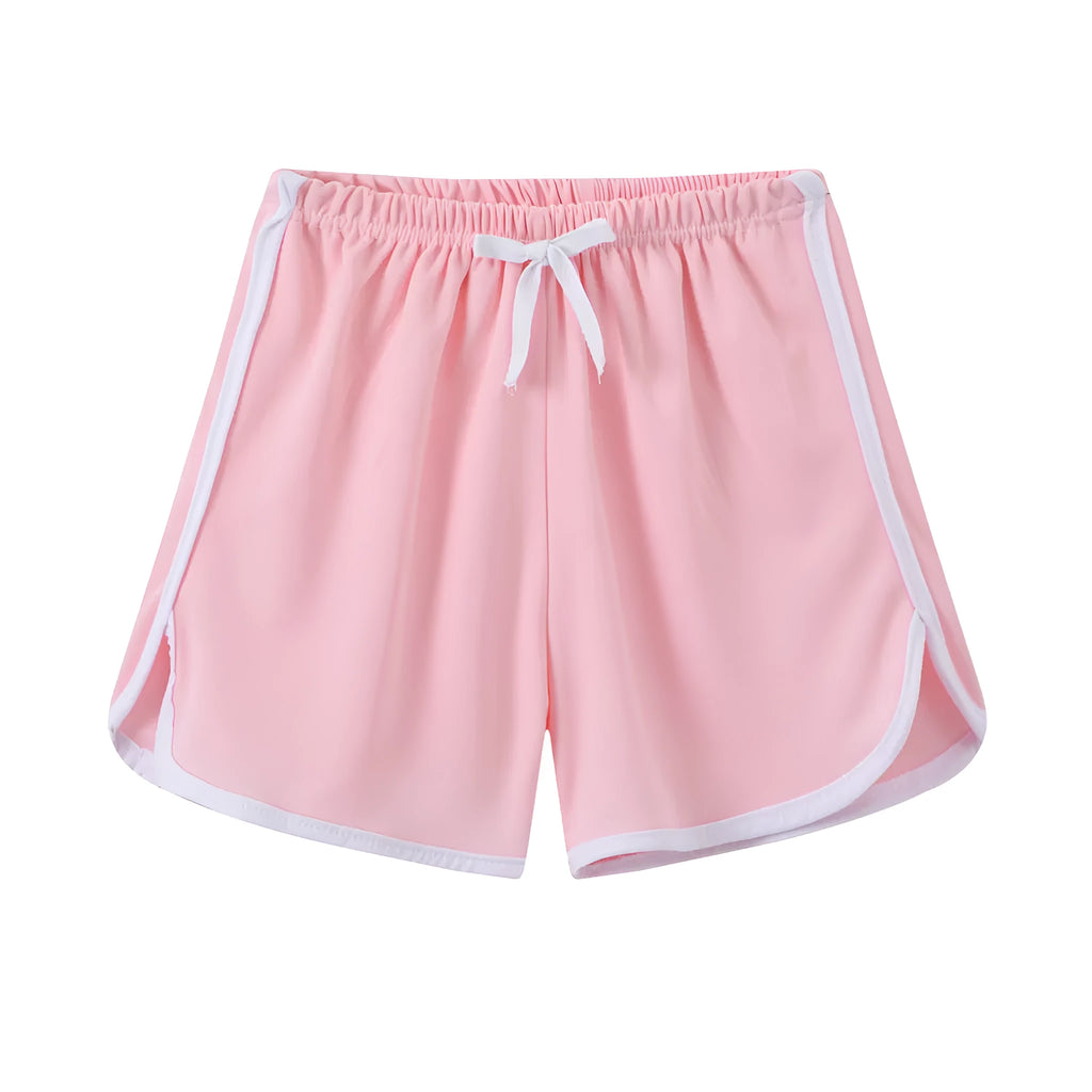 Children's polyester beach shorts in multiple colour and pattern options including solids, stripes, and fruit prints