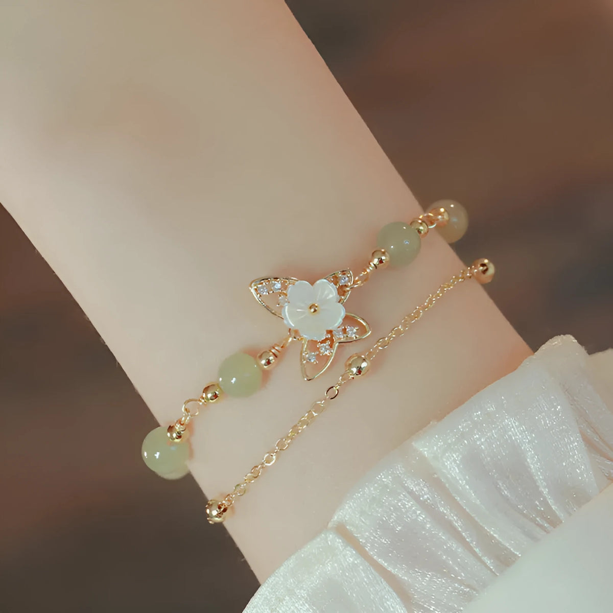 Yellow gold electroplated copper butterfly bracelet with geometric shape for women