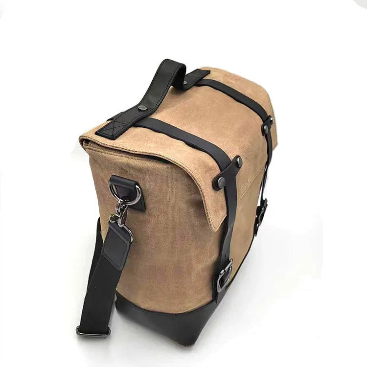 Canvas and cowhide motorcycle side pannier pack with waterproof construction