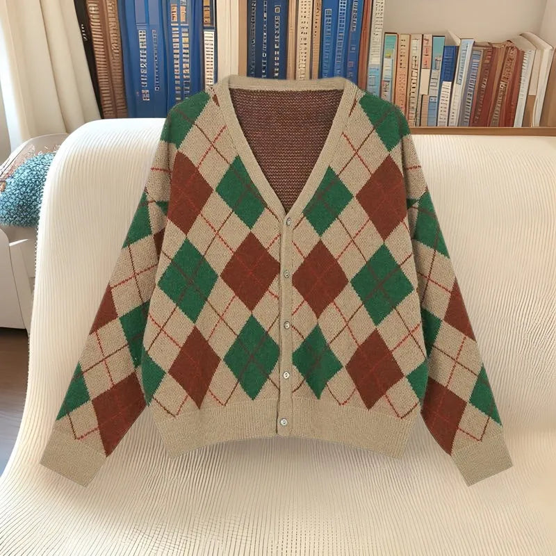 A knitted casual cardigan in a macaron colour, shown in a regular fit with regular-length sleeves.