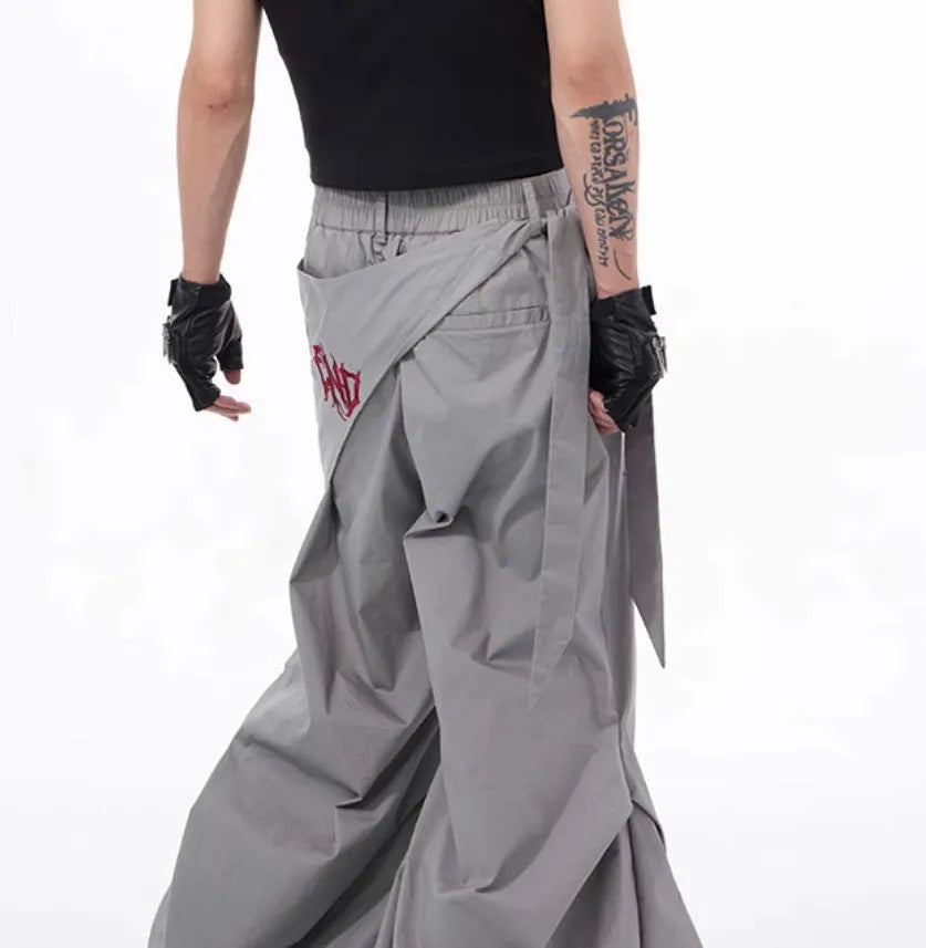 Boys wide-leg Korean style trousers in black and grey colours showing summer functional design