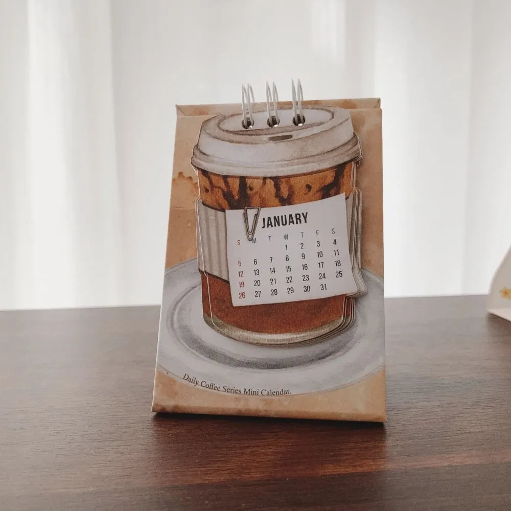 Mini paper desk calendar for 2025 with simple modern design and themed options