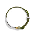 Hetian jade and sterling silver Chinese national bracelet on spring green cord carrying strap