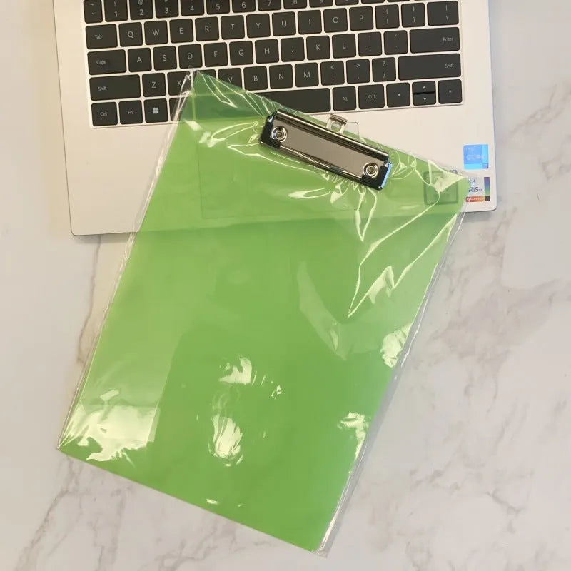 Clear plastic A4 plate holder with metal clip holding documents, available in multiple colours including blue, green, red and white.