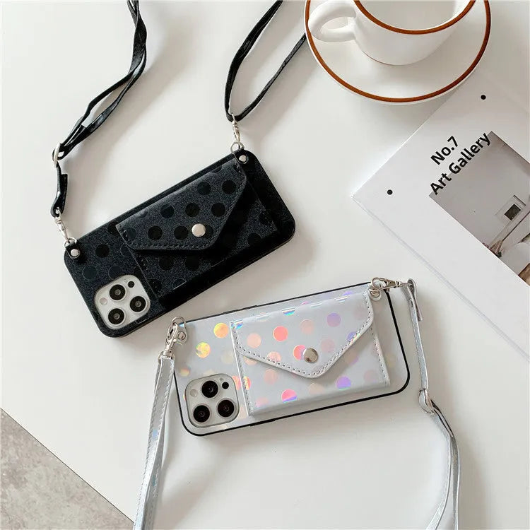 Black silicone iPhone case with a diagonal card slot and wave point texture on the back.
