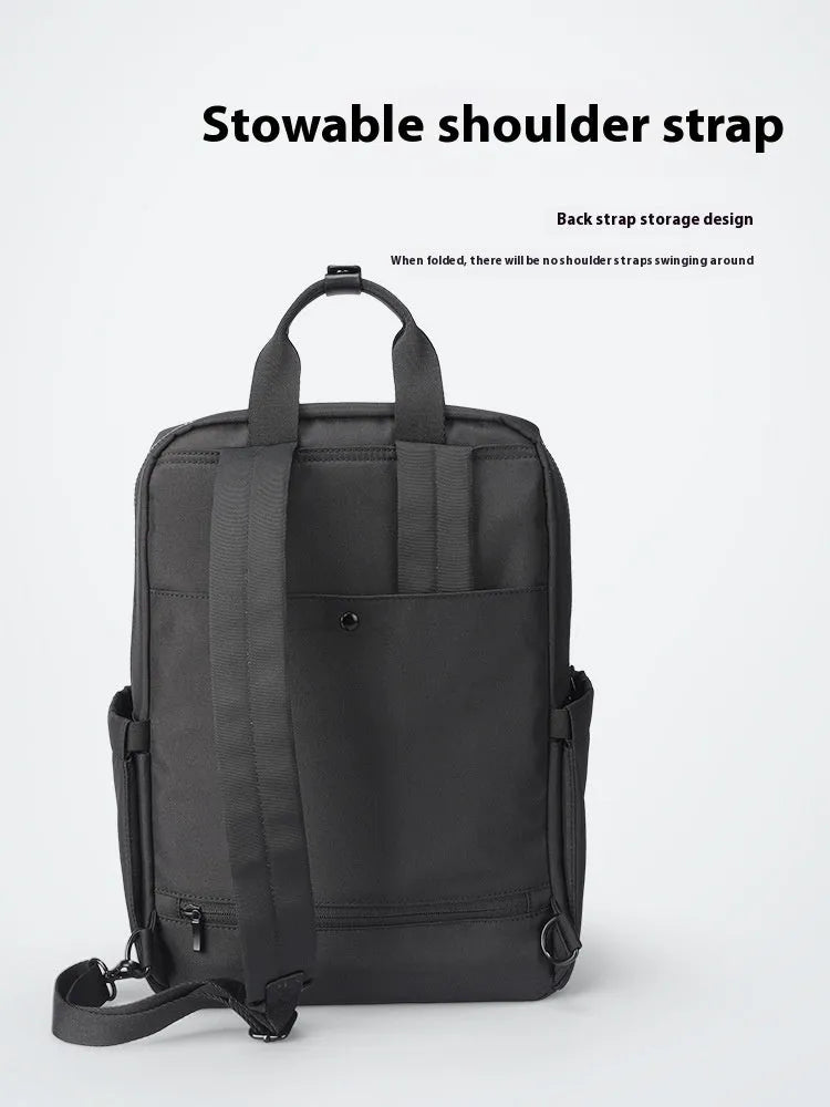 Black Oxford cloth computer backpack with a 20-35 litre capacity for laptop storage.