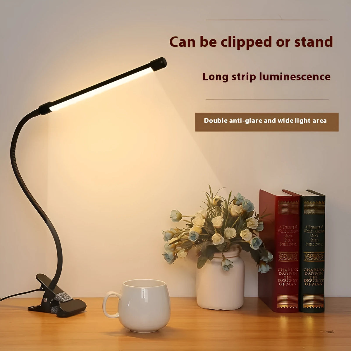 Black and white USB-powered LED desk lamp with 26 cm length for study desks.