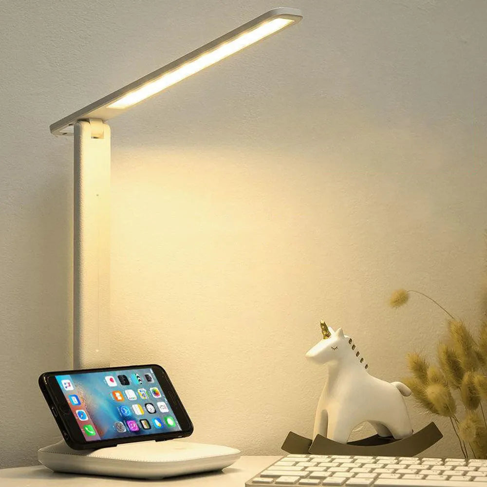 White plastic bedside lamp with touch dimming controls and USB charging port