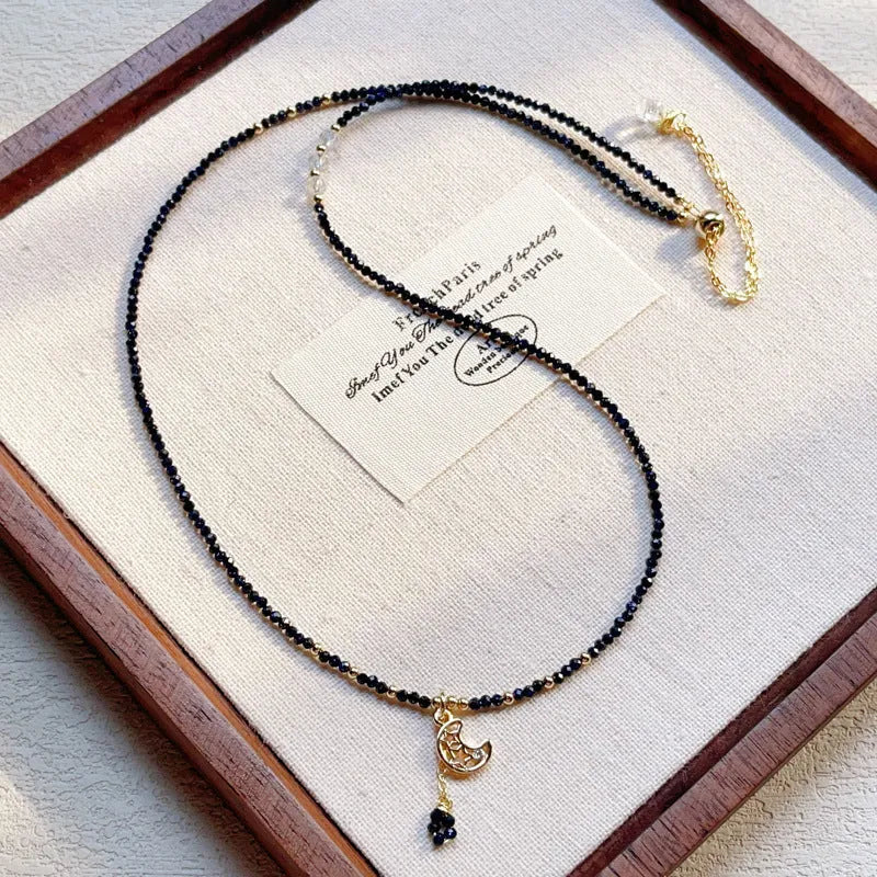 Blue and gold multi-layer women's bracelet with cut sand stone on a three-ring design.