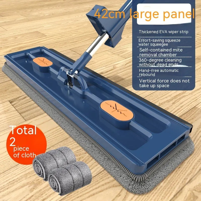 Large blue flat mop with long stainless steel handle and 360-degree rotating head on a hard floor