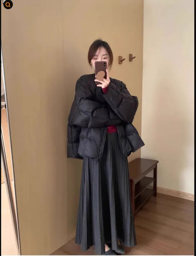 Dark grey knitted ethnic style dress suit with collage stitching, featuring a sweater and skirt.
