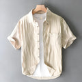 Man modelling a loose-fit apricot pure cotton short sleeve casual shirt