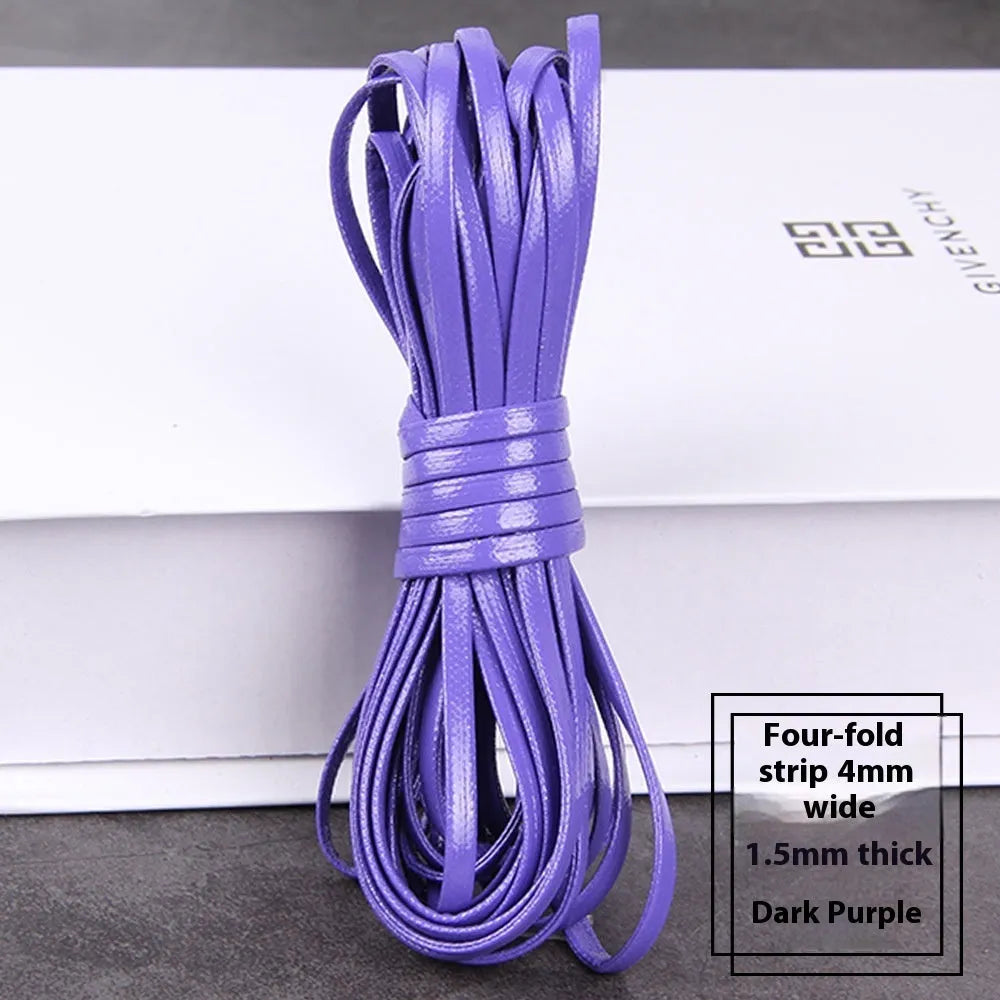 Coiled PU leather woven cord in multiple colours showing beige, black, blue, and red options on a wooden surface.