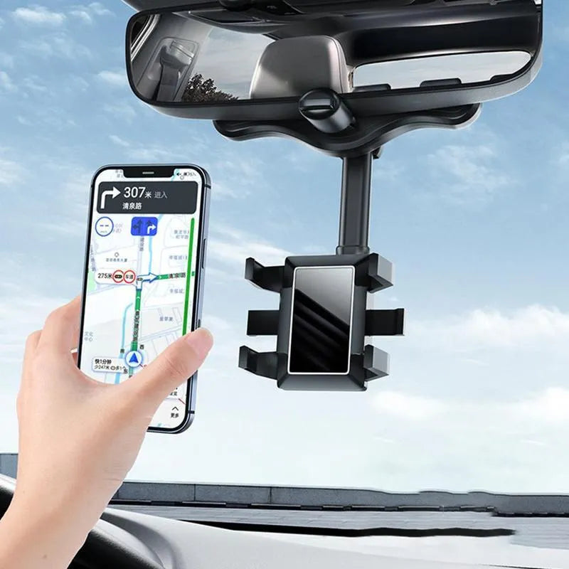Black rearview mirror car phone holder with telescopic arm and four-claw phone grip, shown in a vehicle.