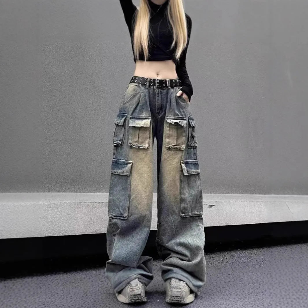 Loose multi-pocket distressed jeans with straight-leg cut and tooling style pockets
