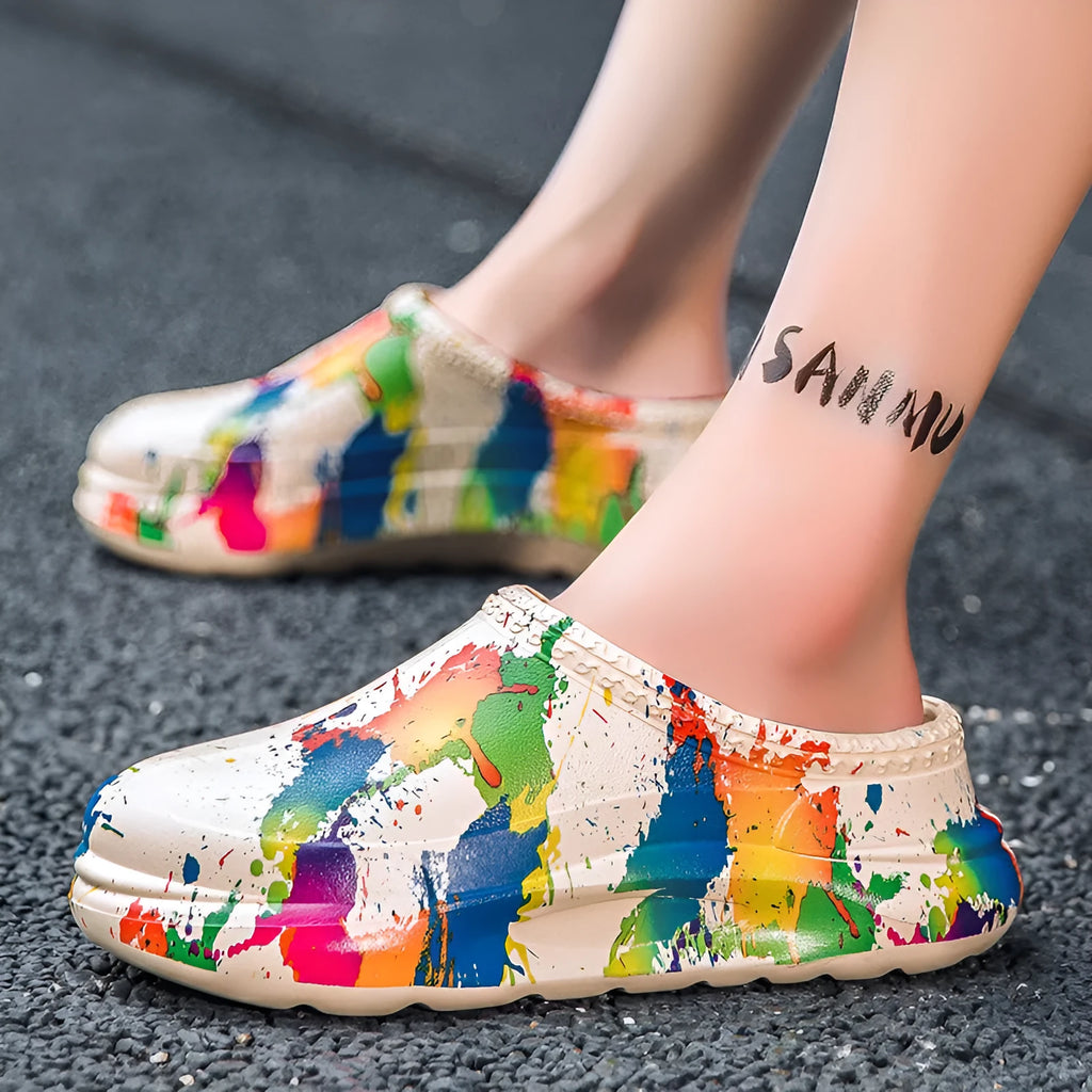 Men's black waterproof slip-on work shoes with platform sole and toe cap design