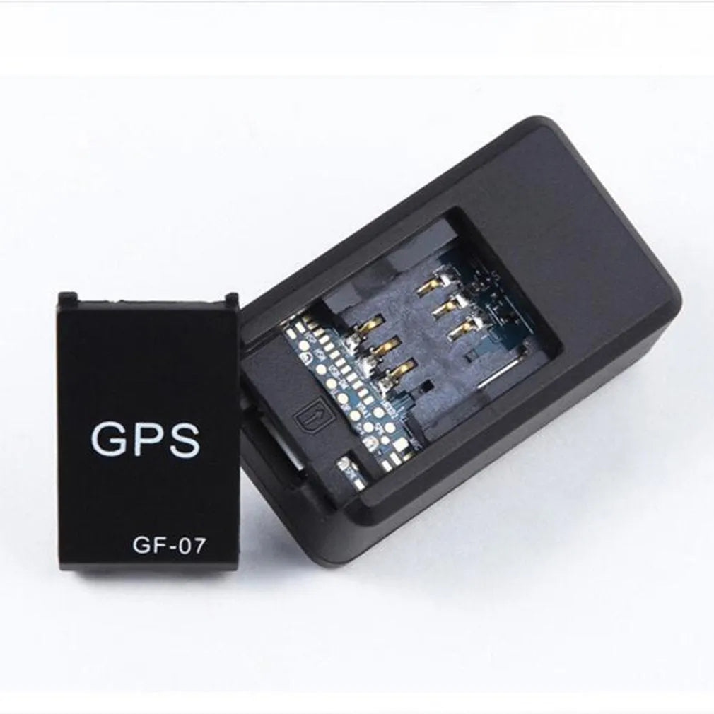 Black mini magnetic GPS car tracker device showing compact size and USB charging cable