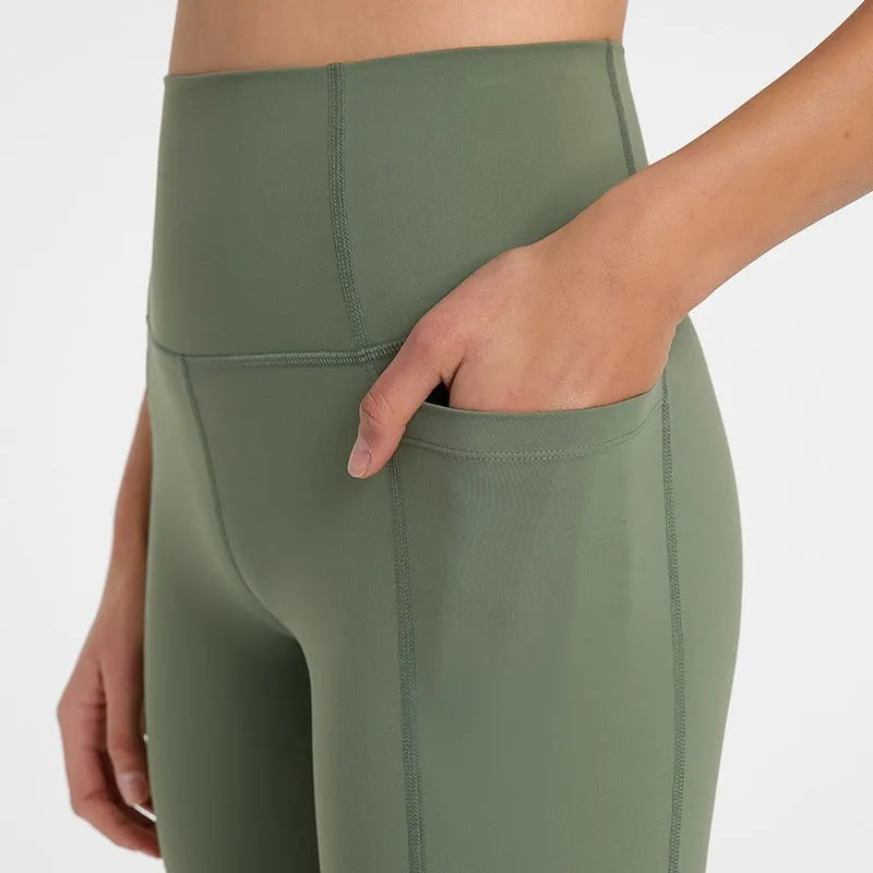 Women's tight-fit sports shorts in cotton blend fabric, shown in black, for running and gym workouts.