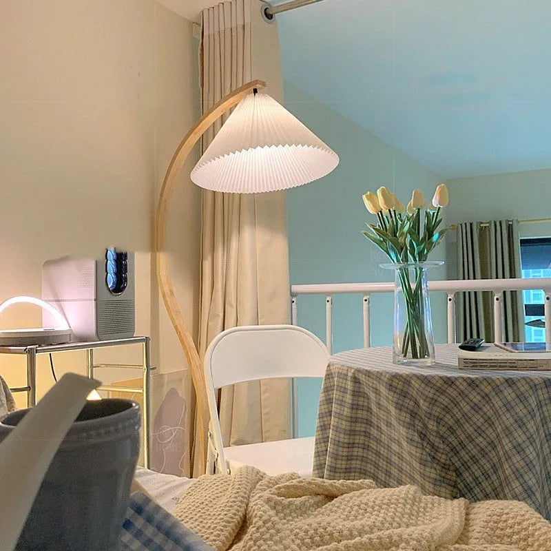 Vertical wooden table lamp with retro design in log white finish showing three colour light settings