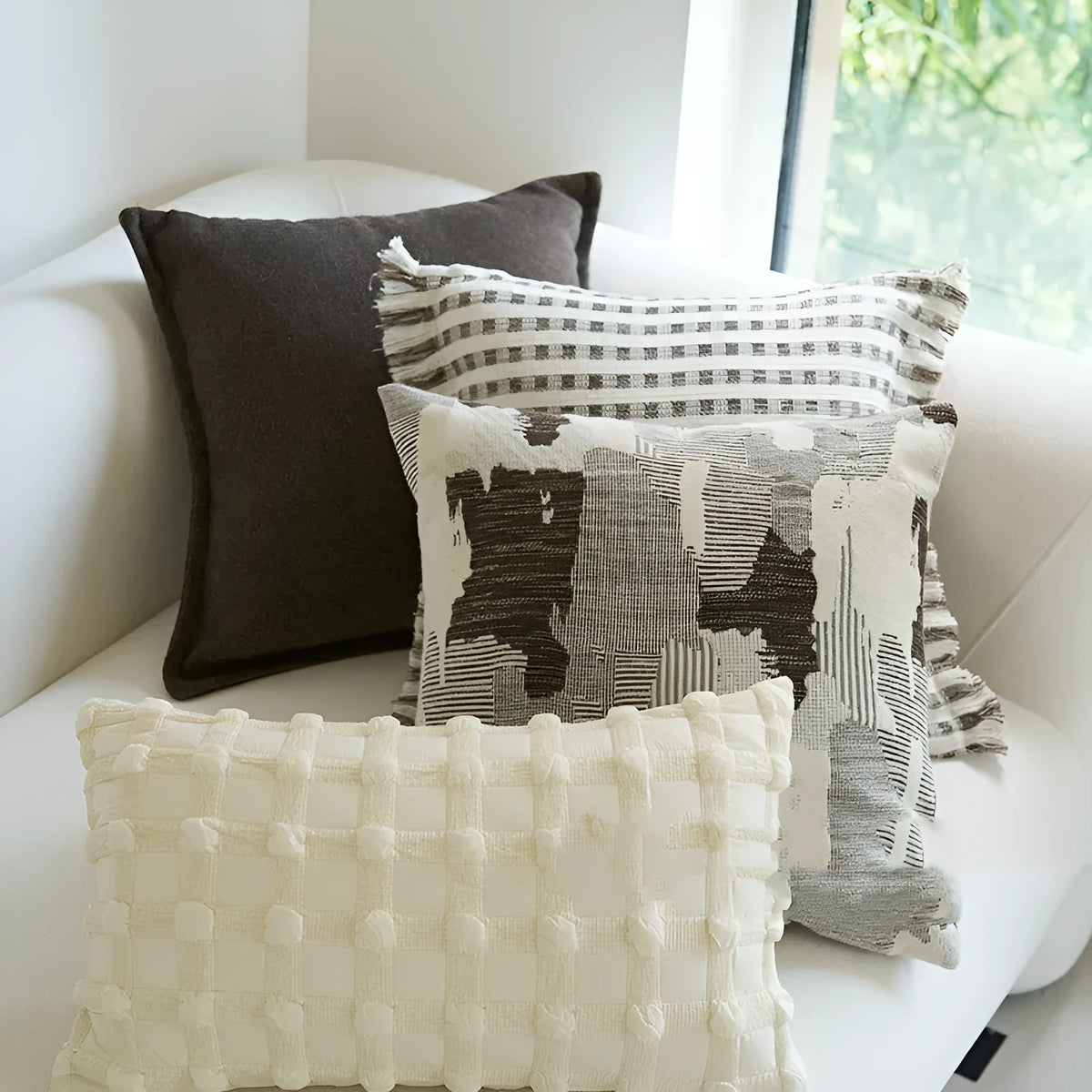 Coffee brown striped mid-century decorative cushion pillow on a grey sofa