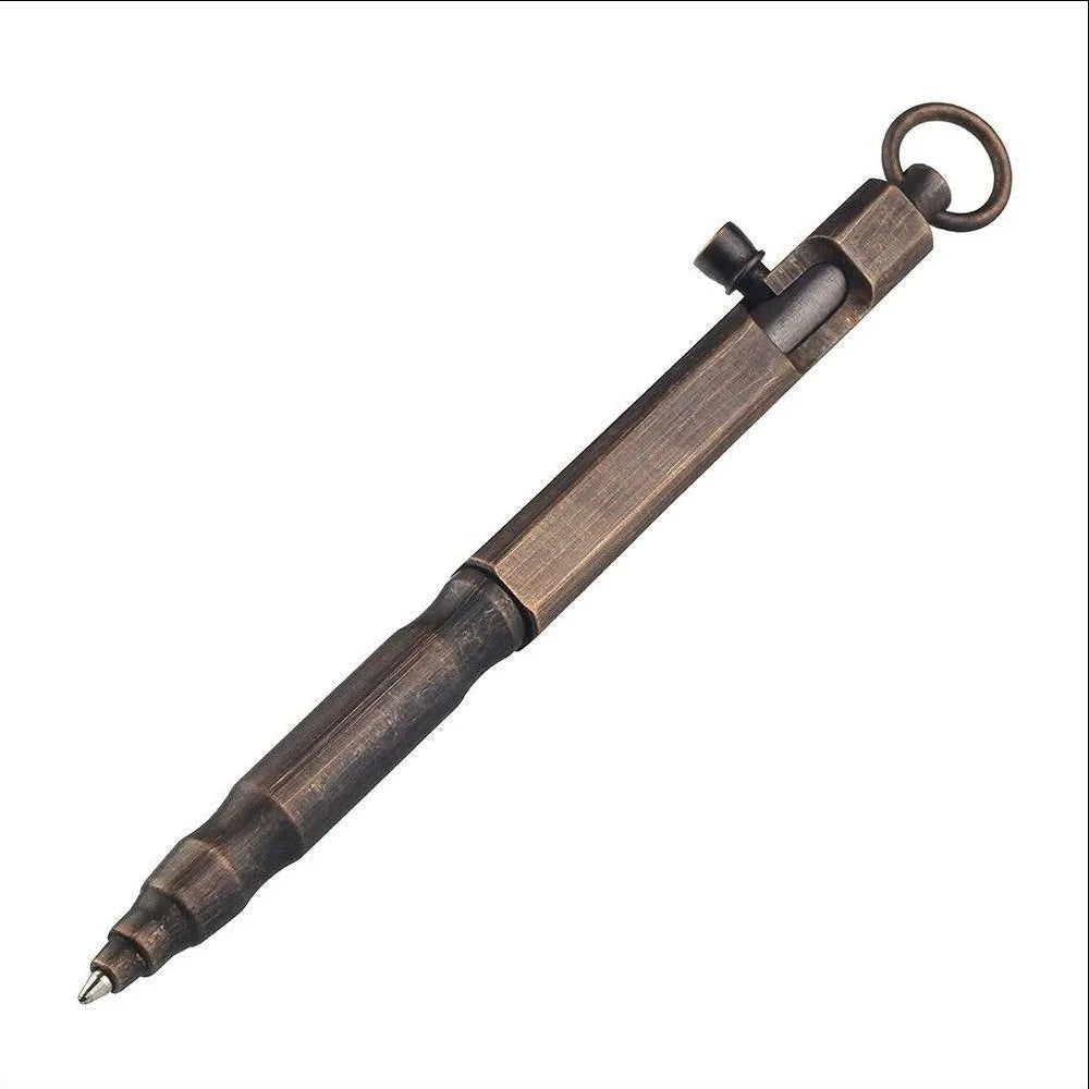 Brass tactical pen with hexagonal bolt design and machine gun aesthetic on a dark background.