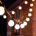 10-metre solar-powered festival light string with 40 LED bulbs and black wire