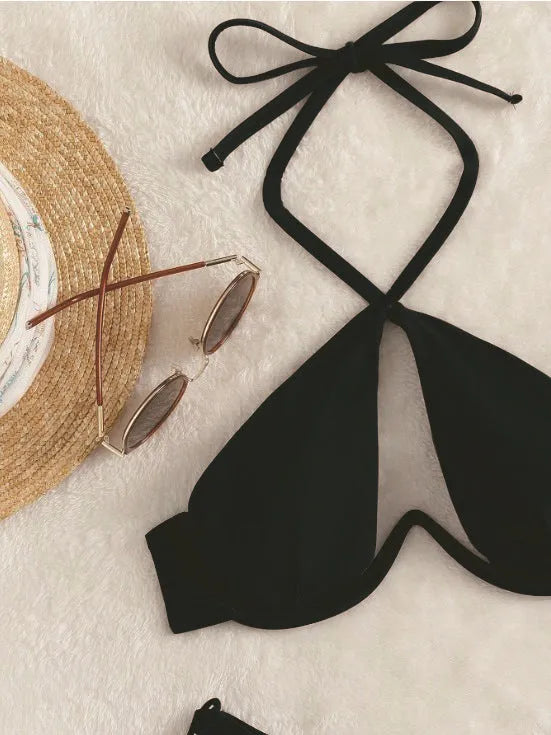 Brown women's halter bikini swimsuit with briefs bottom on a neutral background.