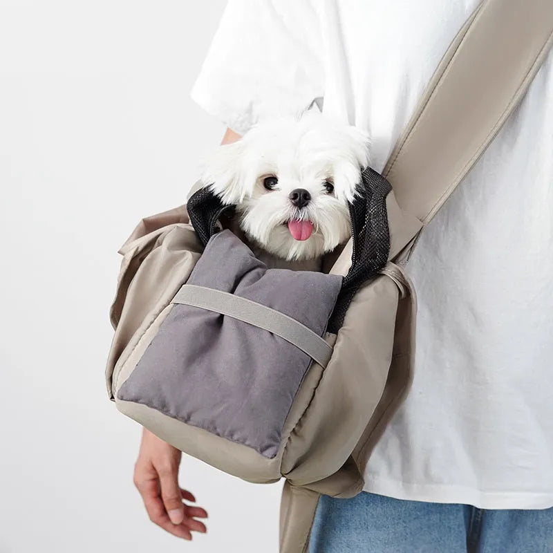Apricot coloured cloth pet handbag carrier with shoulder strap for small dogs or cats.