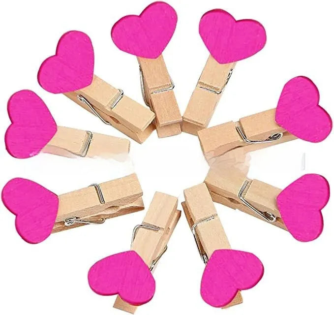 Set of five solid wood heart-shaped clips in red, pink, white, yellow, and rose colours.