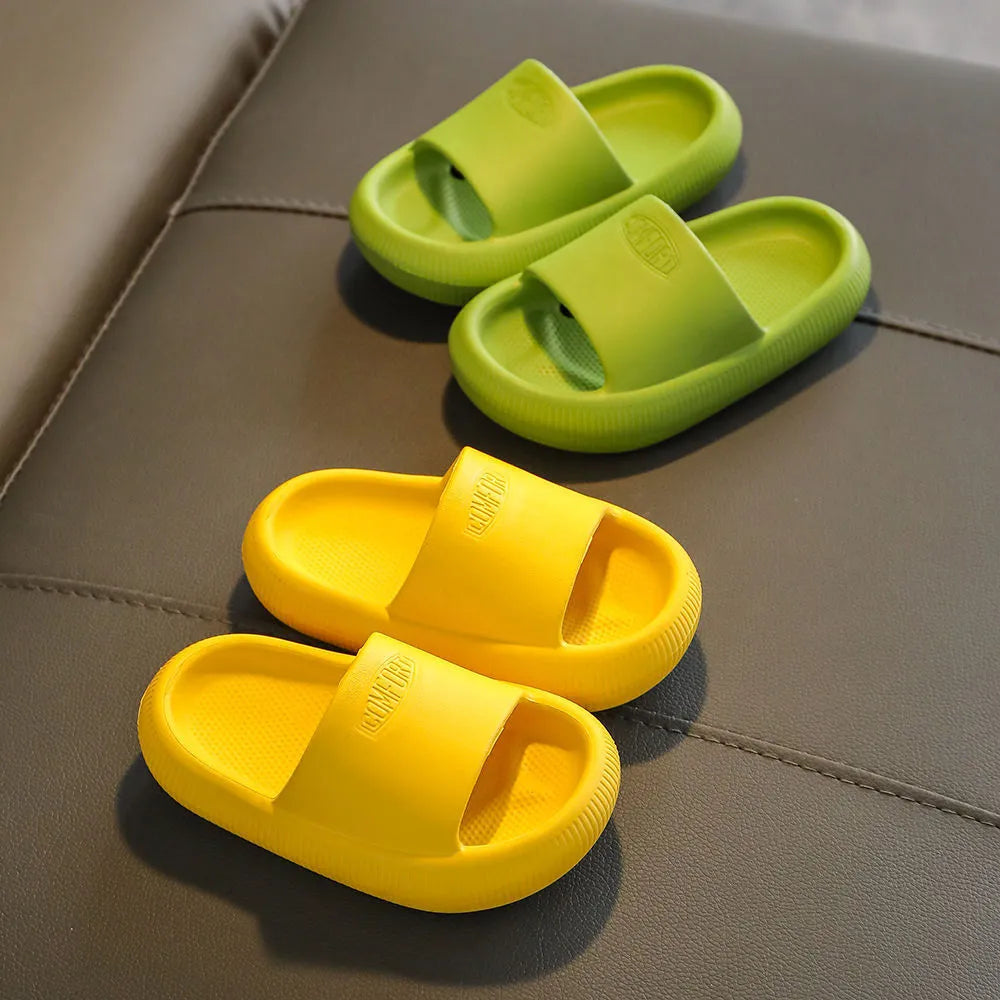 Children's EVA slippers in mixed colours with a textured non-slip sole, shown in sizes for kids.