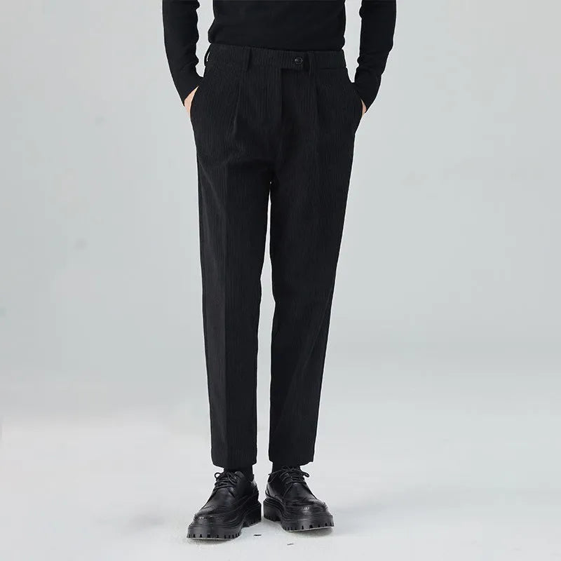 Corduroy straight-leg men's trousers in beige colour showing texture detail