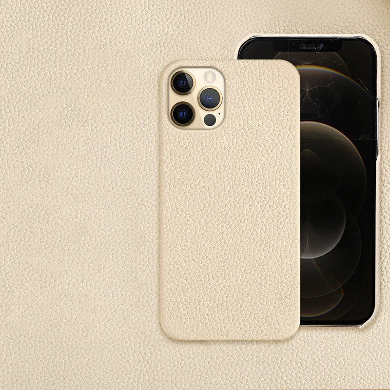 Genuine leather half-frame protective case for iPhone on a table in beige colour.