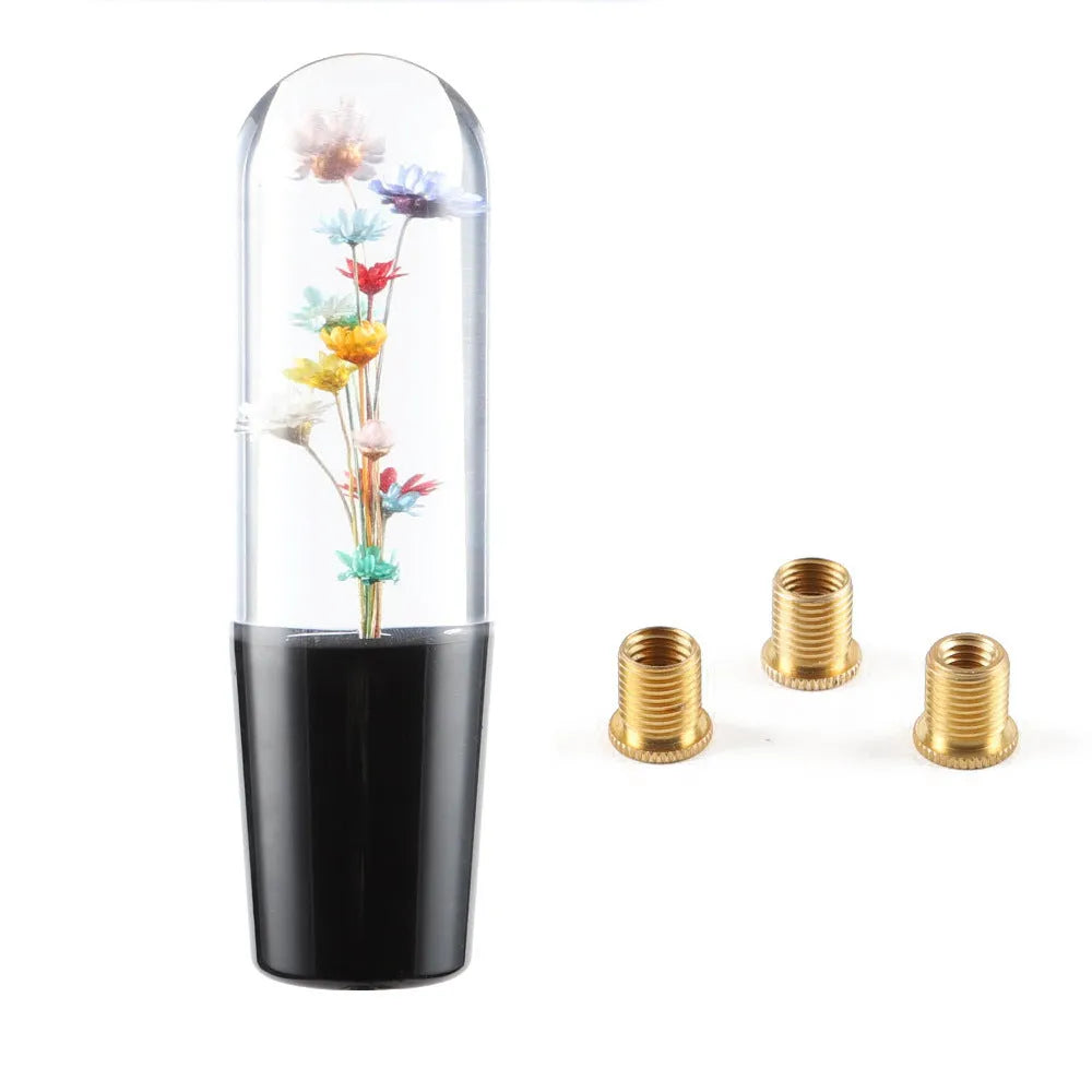 15cm transparent crystal car gear knob in multiple colours with three metal adapters for installation.