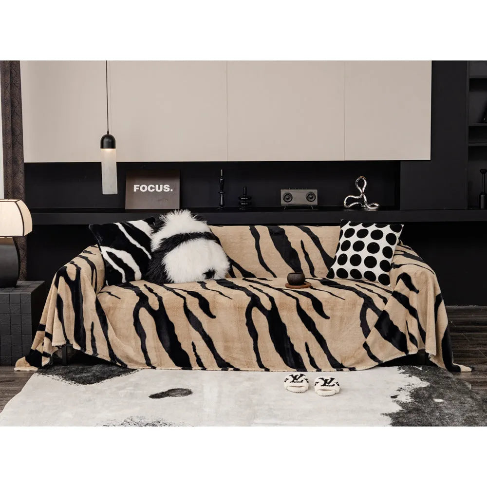 Zebra pattern thickened flannel sofa cover shown in caramel colour with matching pillowcase, demonstrating non-slip fit.