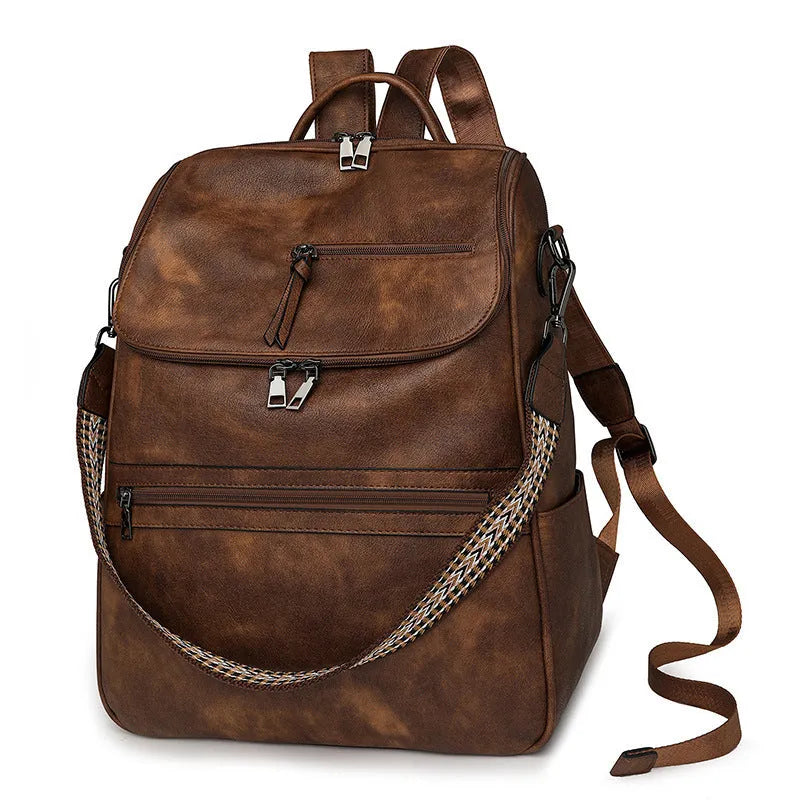 Retro college backpack in PU leather with curved shoulder straps shown in available colour variations