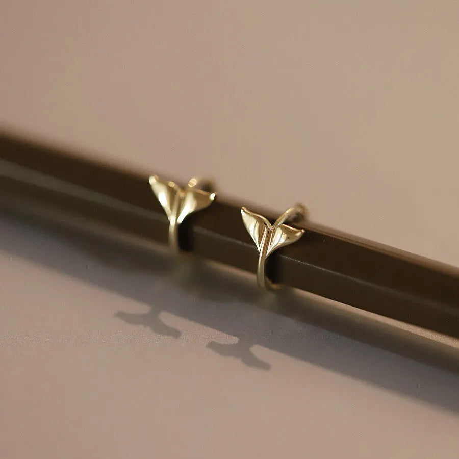 S925 sterling silver fishtail earrings with gold plating showing smooth polished surface