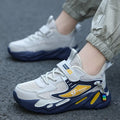 Boy's dark blue double mesh sports shoe with Velcro fastening and MD sole.