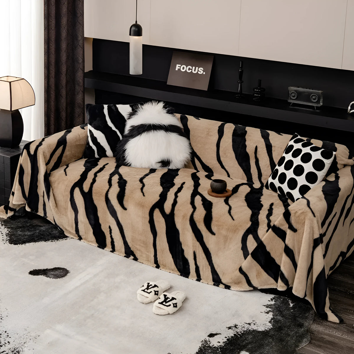 Zebra pattern thickened flannel sofa cover shown in caramel colour with matching pillowcase, demonstrating non-slip fit.